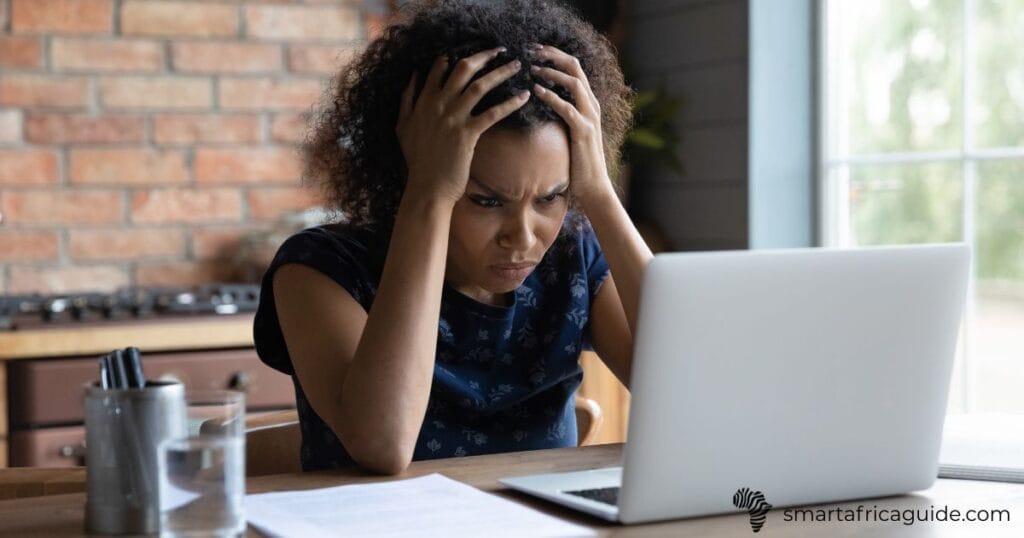 Kenyan student using laptop for e-learning portal login