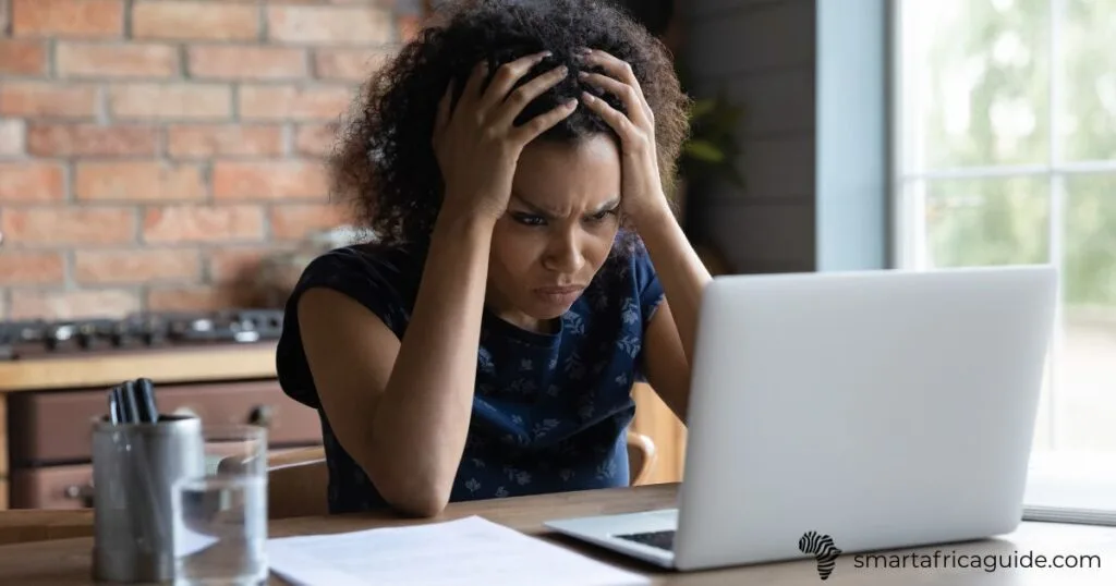 Kenyan student using laptop for e-learning portal login