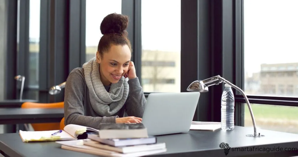 african student learning on laptop
