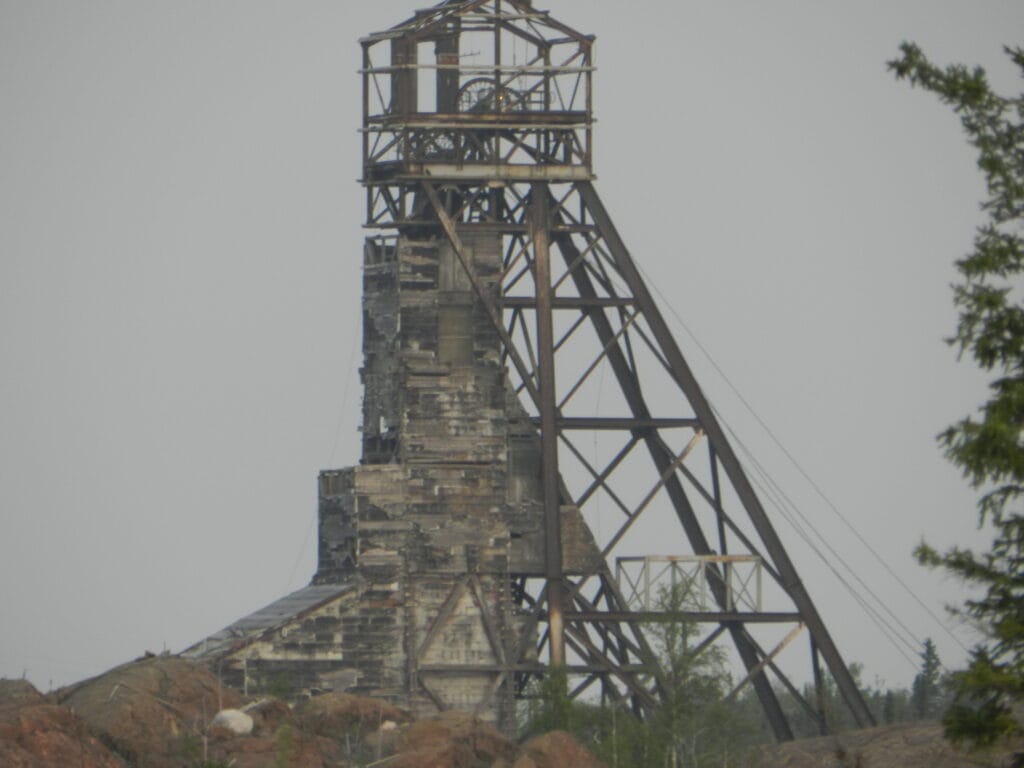 Modern steel headframe at Giant Mine in Canada illustrating sloped-leg design similar to South African mines.