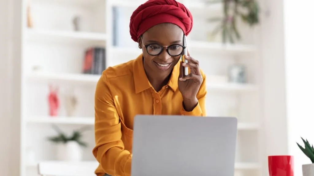 South African student reviewing NSFAS allowances for 2025–2026 while studying at home