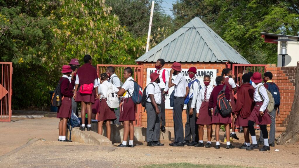 KCB Scholarship students outside school