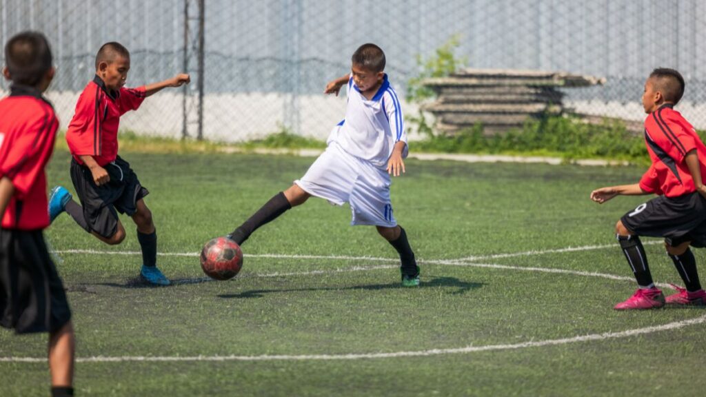 kids playing football