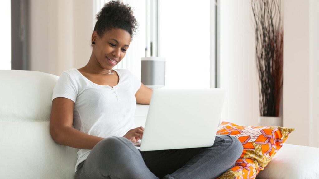 Student checking laptop