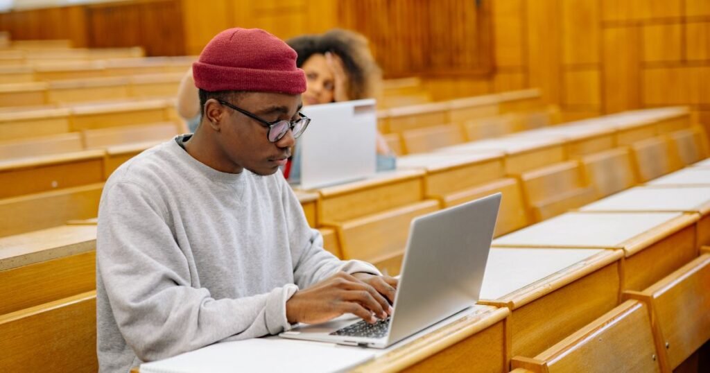 Student Checking NWU Application Status on Laptop